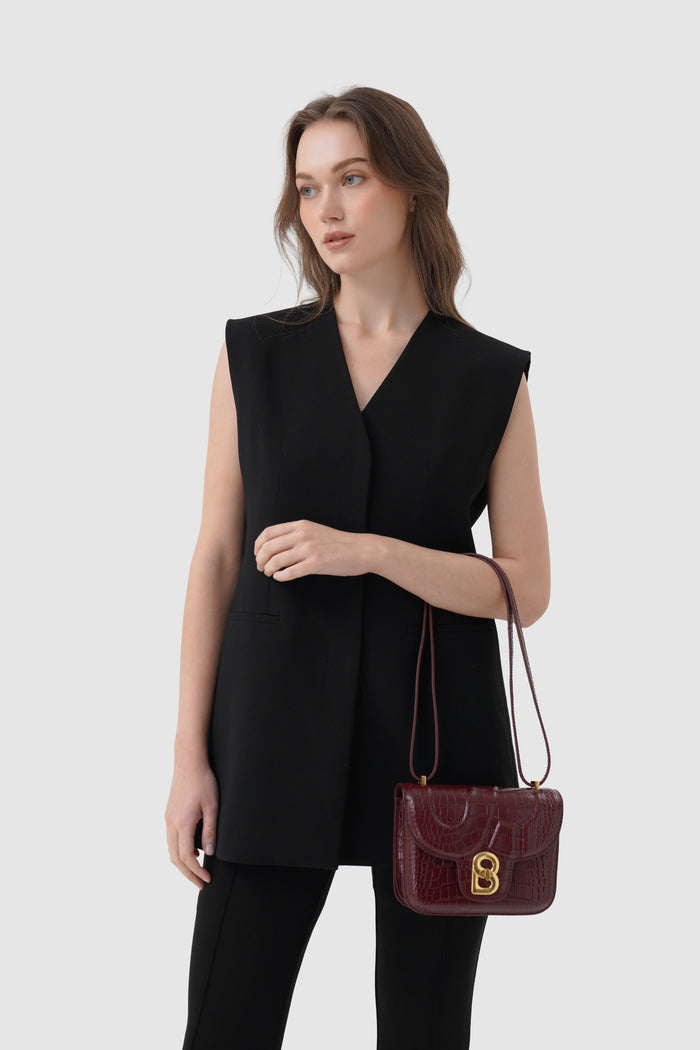 alba bag croco in burgundy by buttonscarves carried on wrist