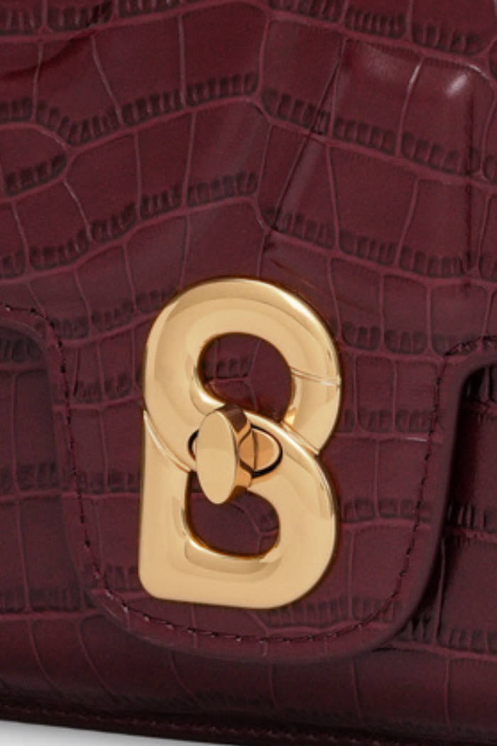 alba bag croco in burgundy by buttonscarves signature b twist lock detail