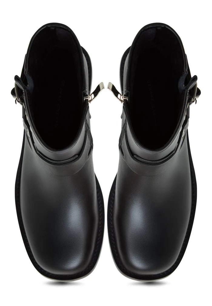 A stylish pair of leather motorcycle boots, perfect for bikers looking for waterproof and durable biker footwear.