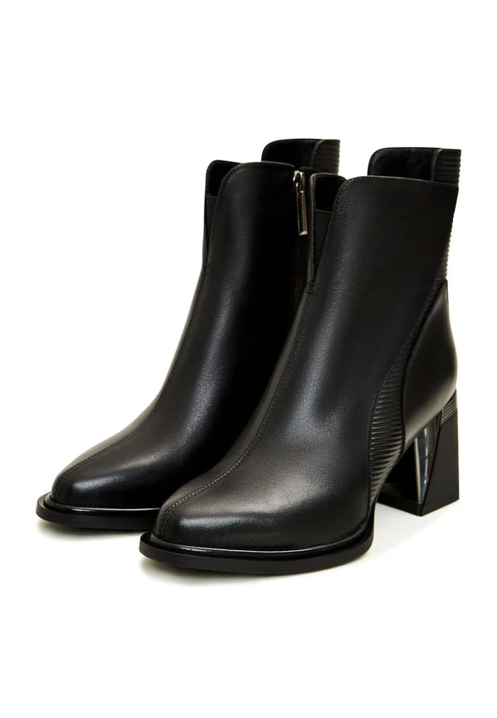 A stylish pair of black block heel ankle boots with a sleek design perfect for any outfit.
