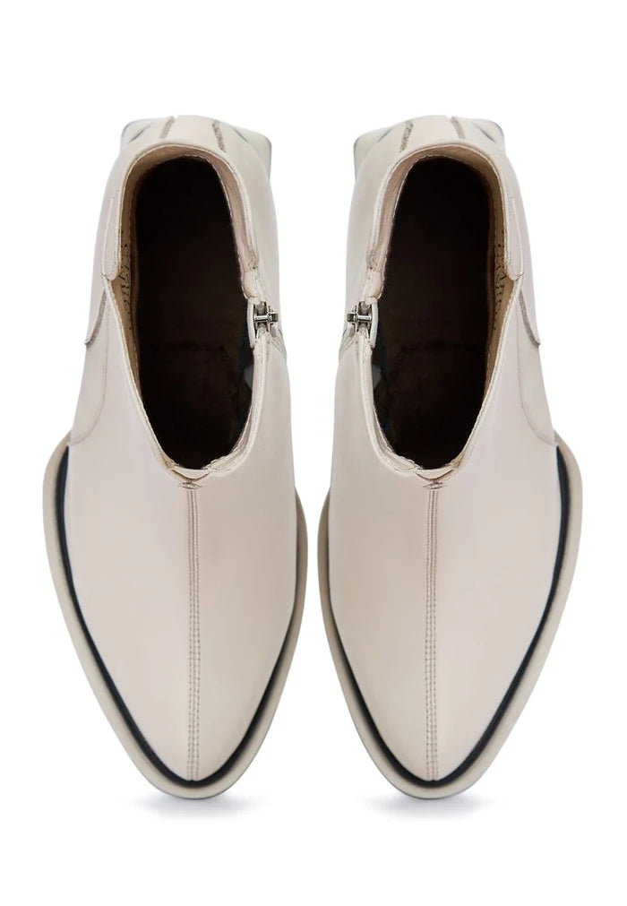 A stylish pair of off white block heel ankle boots for women, featuring a fashionable design with chunky heels, perfect for any outfit.