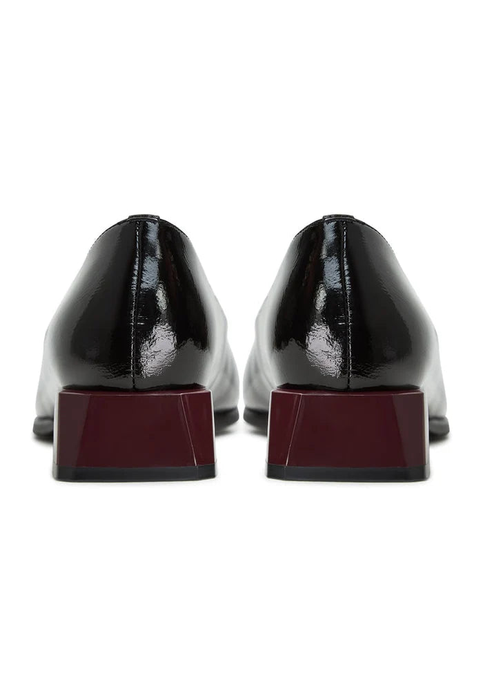 A pair of stylish black block heel ballerina flats known as Ingrid black shoes, perfect for women looking for trendy block heel footwear.