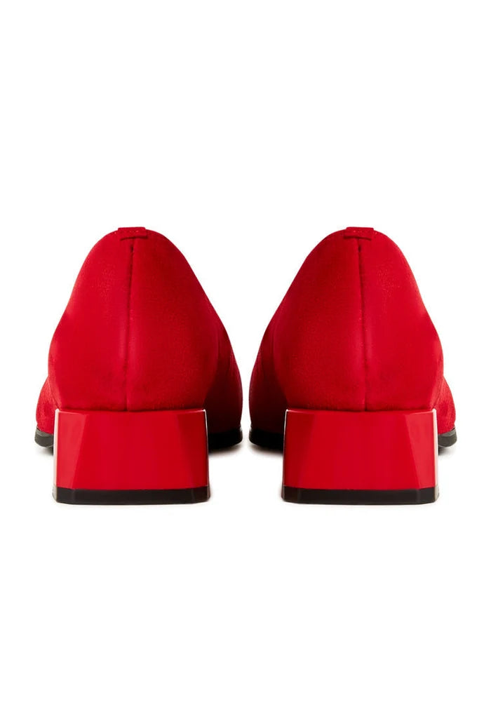 A stylish pair of red block heel ballerinas, the Ingrid ballerinas, perfect for women looking for comfortable yet elegant block heel shoes in red.
