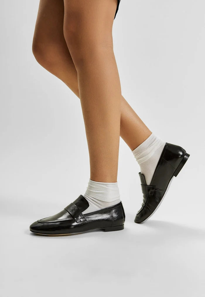 A stylish pair of black Diana block heeled loafers for women, perfect for a chic addition to your fall fashion shoes collection.