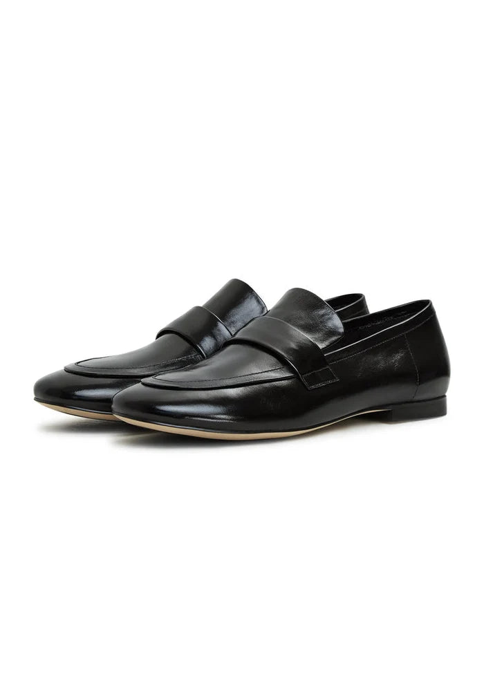 A chic pair of black Diana block heeled loafers, perfect for women's fall fashion wardrobe.