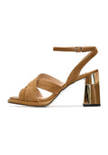 A stylish pair of block heeled beige Evelyn sandals for women, perfect for adding a touch of fashion to any outfit.