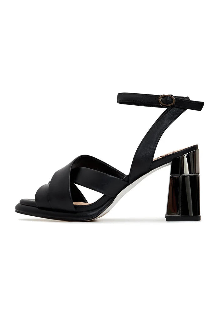 A stylish pair of black block heeled sandals called Evelyn, perfect for any occasion.