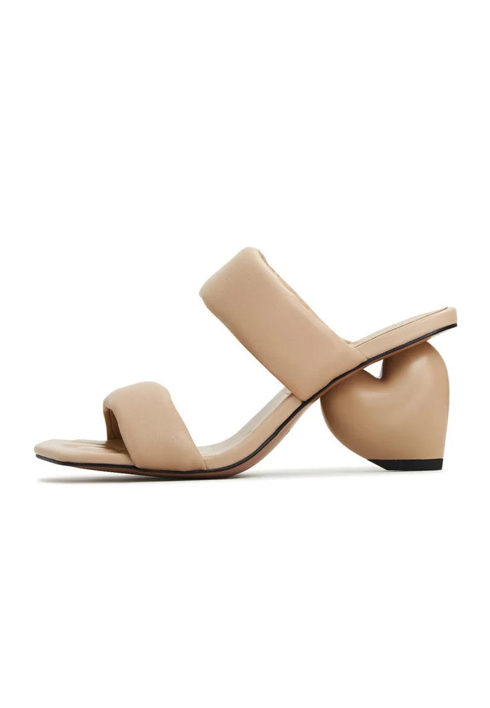 A pair of stylish beige block heeled Isla sandals, perfect for women's summer footwear.