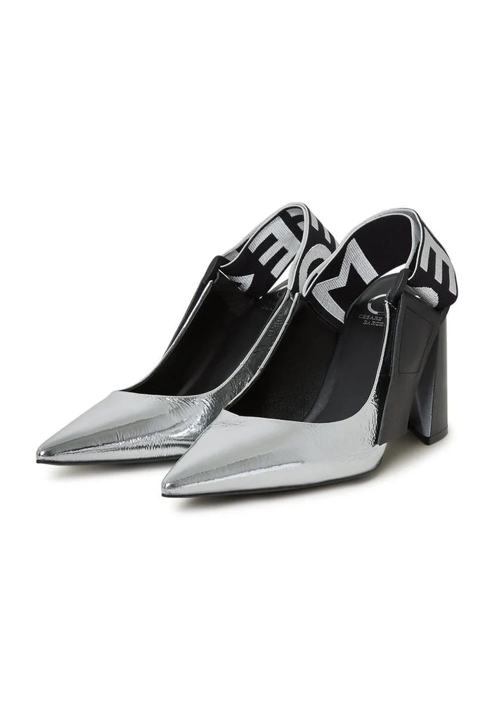 A pair of stylish silver Jimena pumps featuring block heeled and slingback design, perfect for women's footwear fashion.