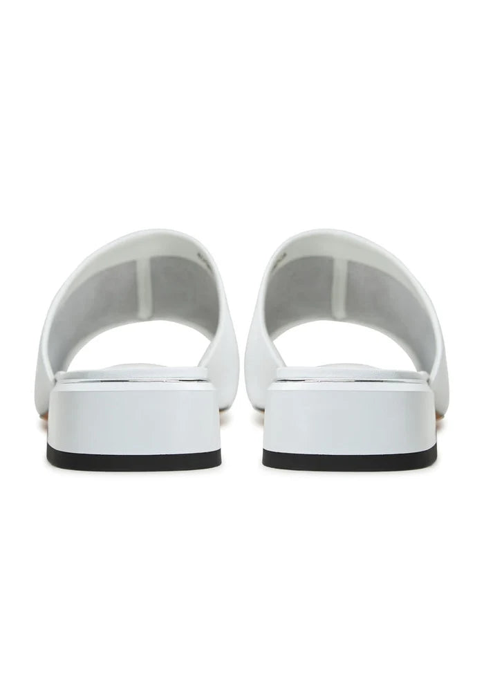 A pair of women's white Block heeled slippers named Slippers Beatriz, featuring a stylish high heel design.