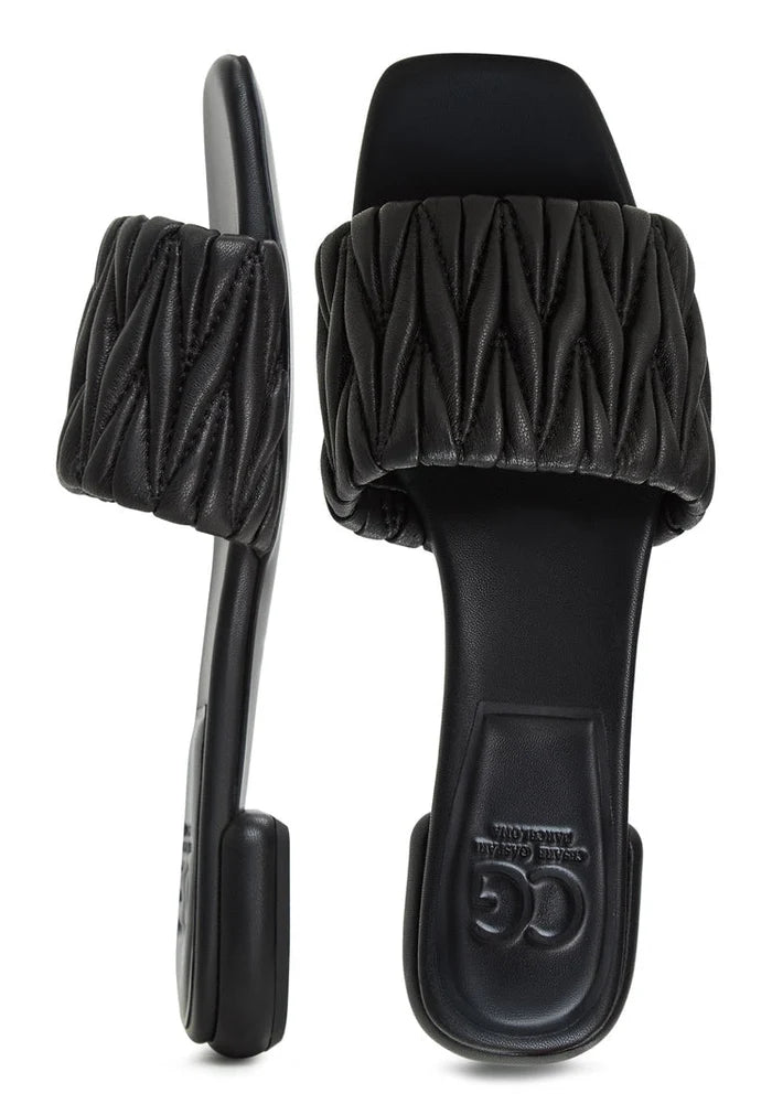 A stylish pair of women's heeled slippers in black by Stephanie brand, featuring a block heel design.