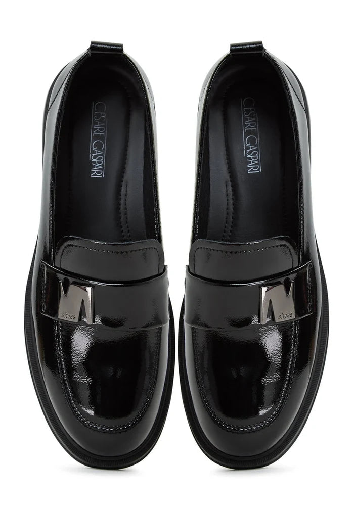 A stylish pair of block heel black loafers for women - perfect blend of fashion and comfort.