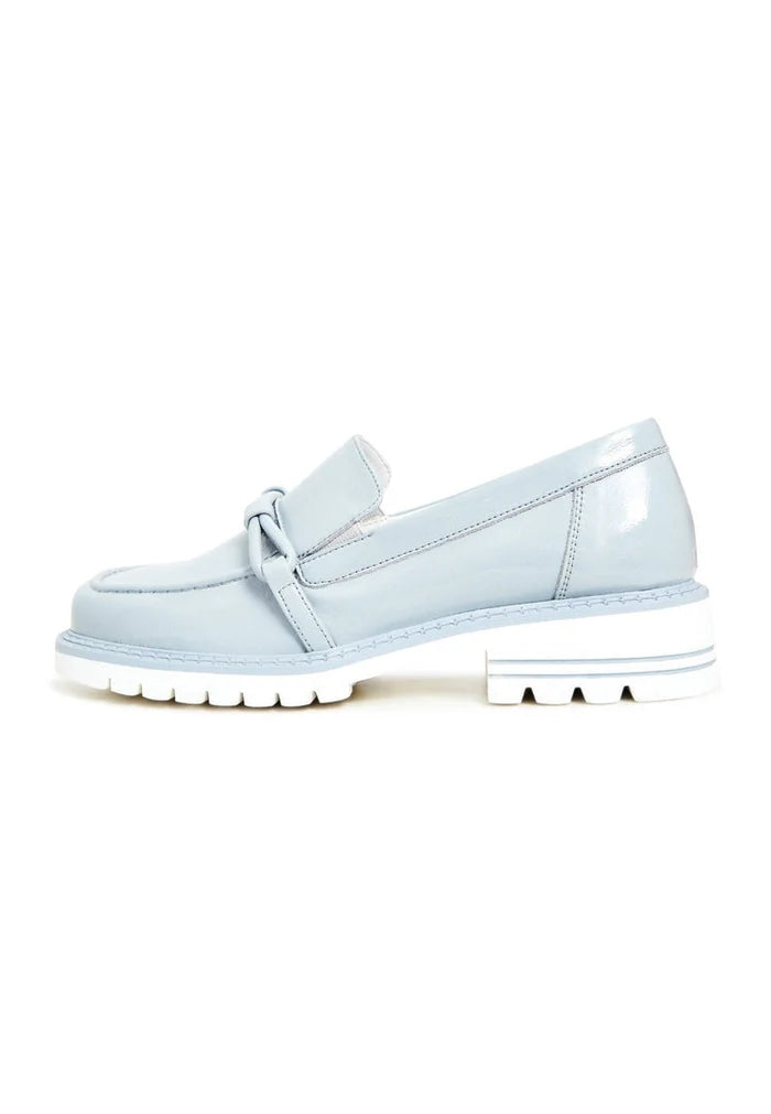 A stylish pair of women's blue block heels loafers, perfect for adding a trendy touch to any outfit.