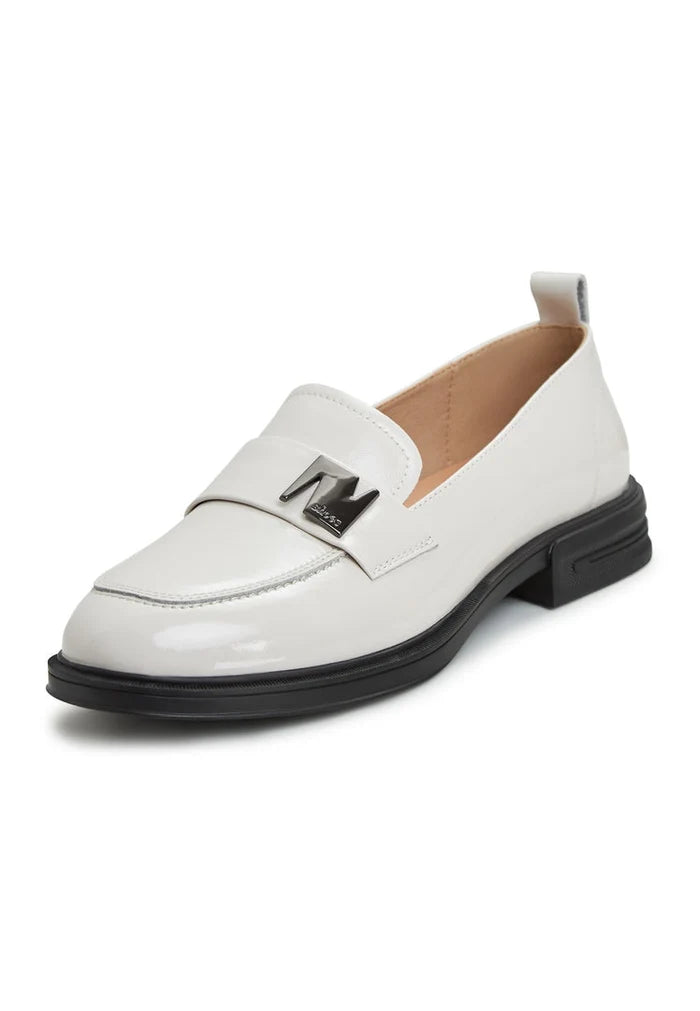 A trendy pair of fashionable white block heel loafers, the perfect addition to any women's shoe collection.
