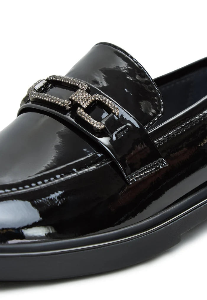 A stylish pair of Maia block heel loafers, perfect for women who love designer and trendy footwear.