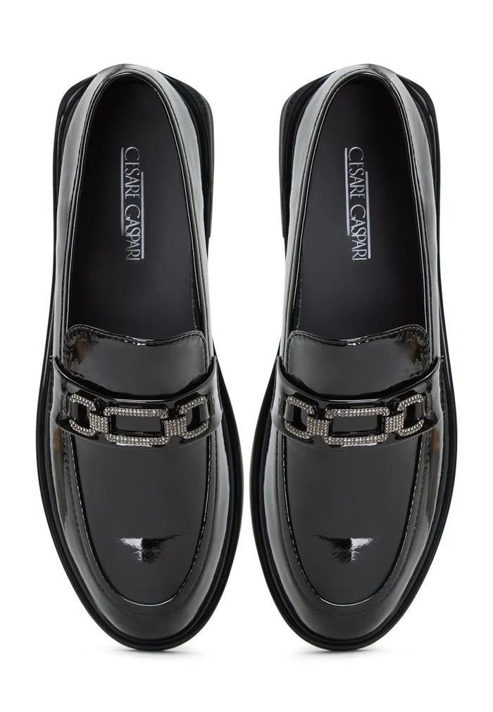 A stylish pair of Maia block heel loafers, a must-have for any woman's wardrobe - designer, trendy, and chic!