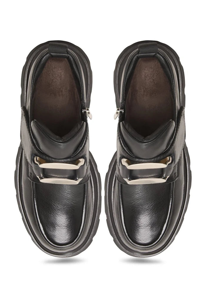A stylish pair of black leather Geirr double buckle loafers, perfect for bold men's fashion footwear looks.