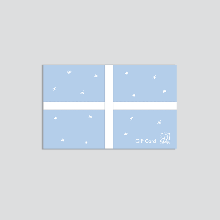 Front view of Brunch gift card with light blue wrap, white ribbon and scattered white star accents on light gray background