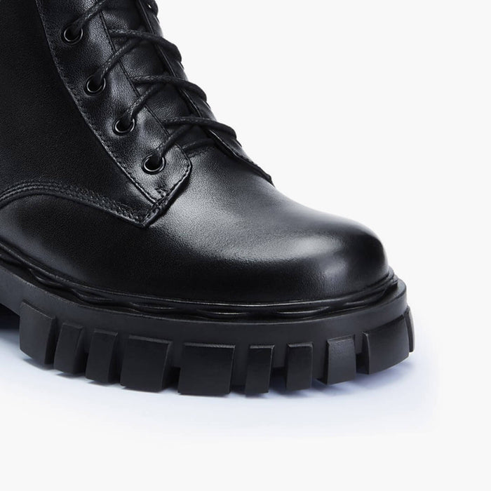 CAMMI - lace up belted army boots