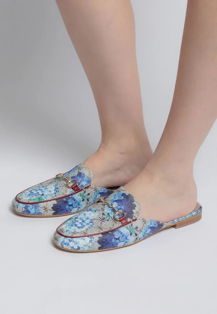 A pair of premium handmade leather loafers featuring a stylish canvas print design, perfect for a sophisticated look.
