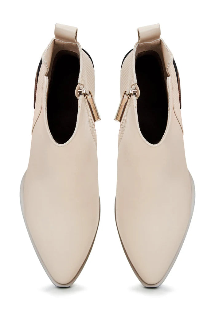 A stylish pair of women's beige casual ankle boots - fashionable and comfortable for everyday wear.