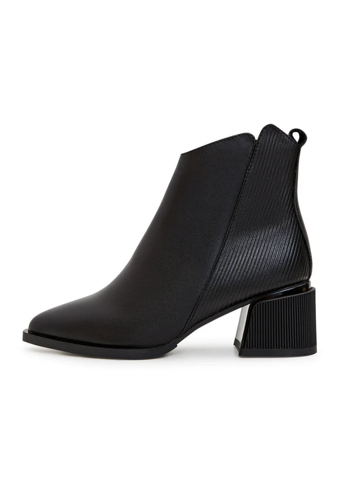 A stylish and affordable pair of women's black suede ankle boots perfect for casual outfits.