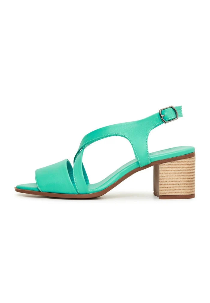 A stylish pair of casual green block heel sandals, perfect for adding a chic touch to any outfit.
