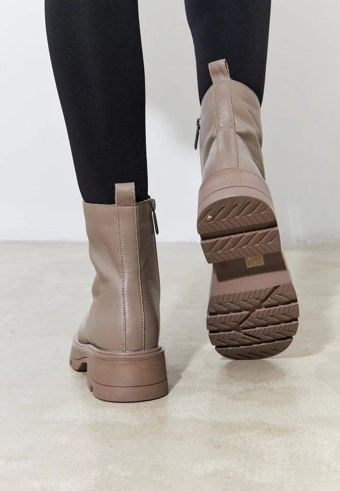 A pair of stylish women's casual lace-up ankle boots in brown, perfect for any fashion footwear collection.