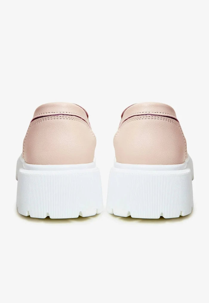 A pair of stylish and comfortable women's pink casual loafers, perfect for any outfit and budget.