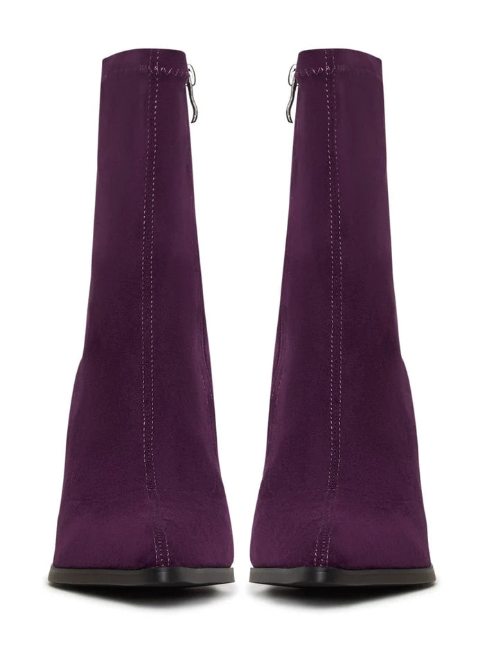 A pair of stylish purple suede ankle boots with block heels, perfect for casual wear.