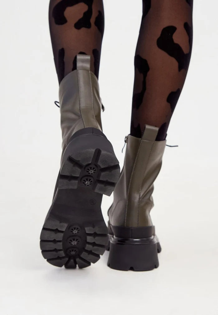 A pair of stylish suede lace-up ankle boots, perfect for a casual and trendy look.