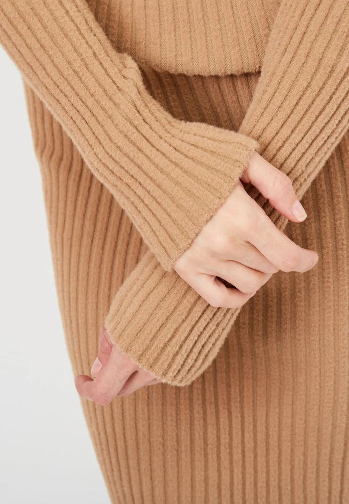 A stylish beige knitted dress from CG clothing collection for women's fashion, perfect for the trendy dresses enthusiasts.