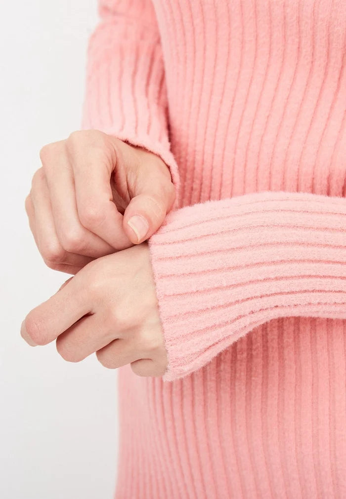 A stylish coral knitted dress for women, also known as CG knitted dress - perfect for any fashion-forward wardrobe.