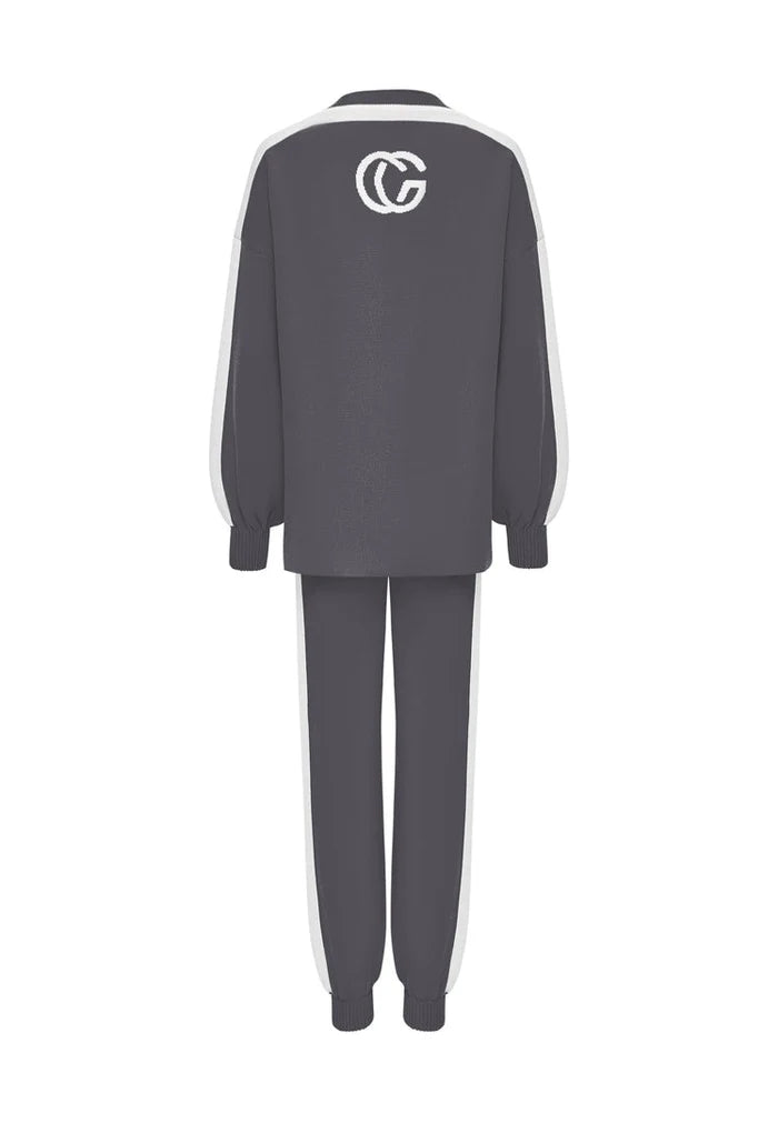 A cozy and stylish grey knitted jogger set, the perfect comfortable loungewear for a coordinated and casual look.