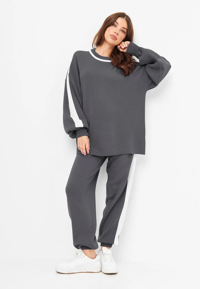 A cozy and stylish knitted jogger set in grey, perfect for lounging in ultimate comfort.