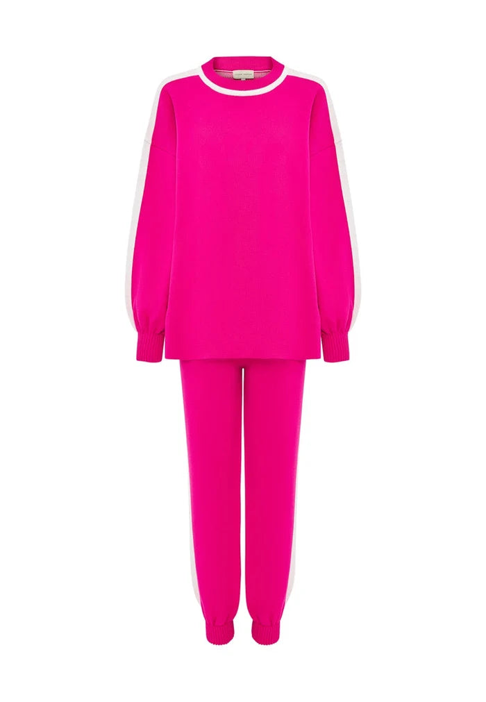 A cozy and stylish pink knitted jogger set, perfect for a casual knitwear outfit.