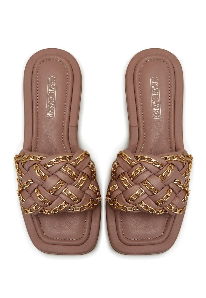 A stylish pair of beige chain leather sandals for women, perfect for any casual or semi-formal occasion.