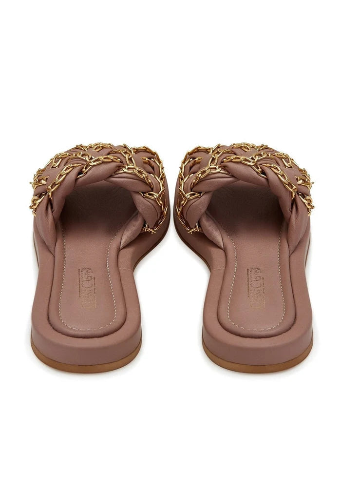 A stylish pair of beige chain leather sandals for women, perfect for adding a touch of elegance to any outfit.