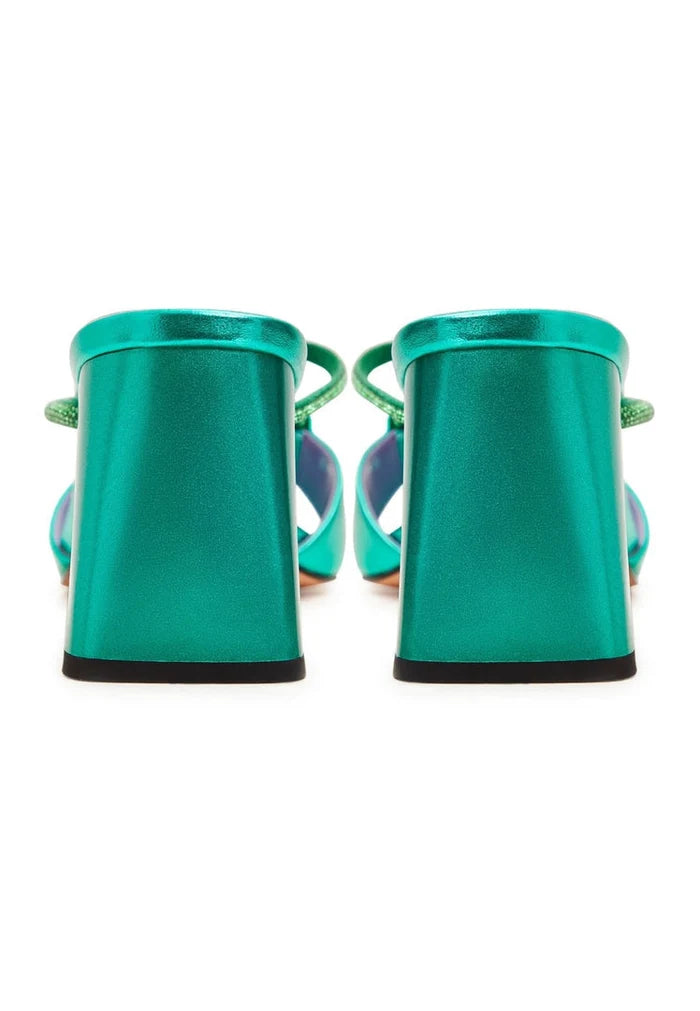 A stylish pair of backless green heels, also known as Rosalia heels, a chic and trendy choice for any outfit.