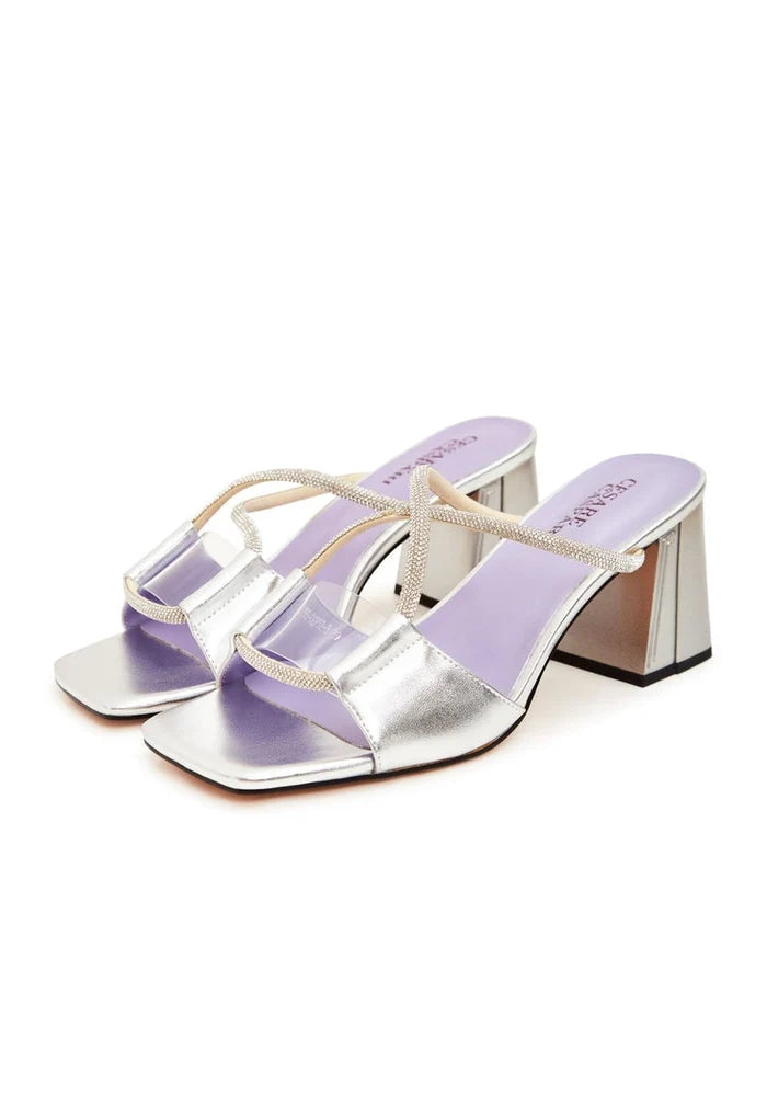 A pair of elegant silver Rosalia high heel sandals with a chic backless design.