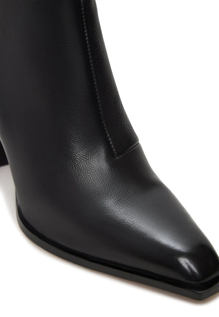 A pair of trendy Athena black block heel boots for women, perfect for a chic and fashionable look.