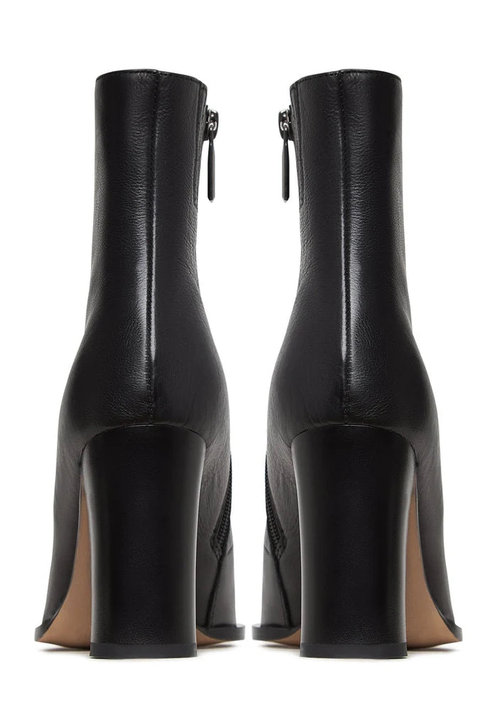 Step out in style with these chic Athena black block heel boots, the perfect addition to any women's black boot collection. Fashionable and versatile, these block heel boots will elevate any outfit to the next level.