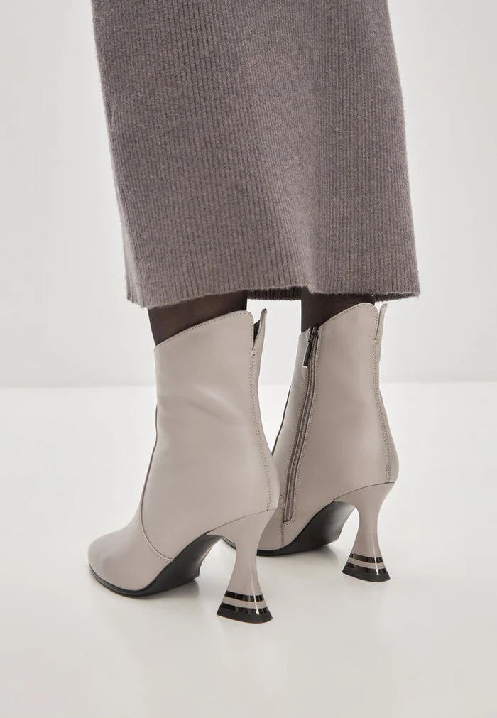 A pair of Cleo grey high-heeled ankle boots - chic and stylish women's fashion shoes.