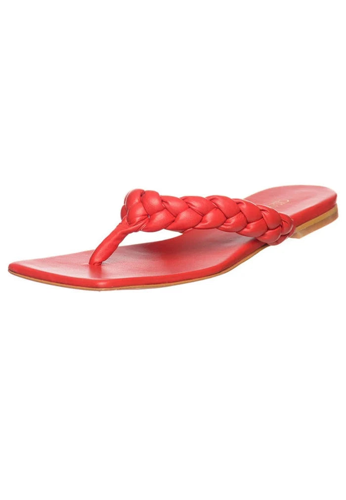 A stylish and trendy pair of red open toe sandals, perfect for a fashionable and chic look.