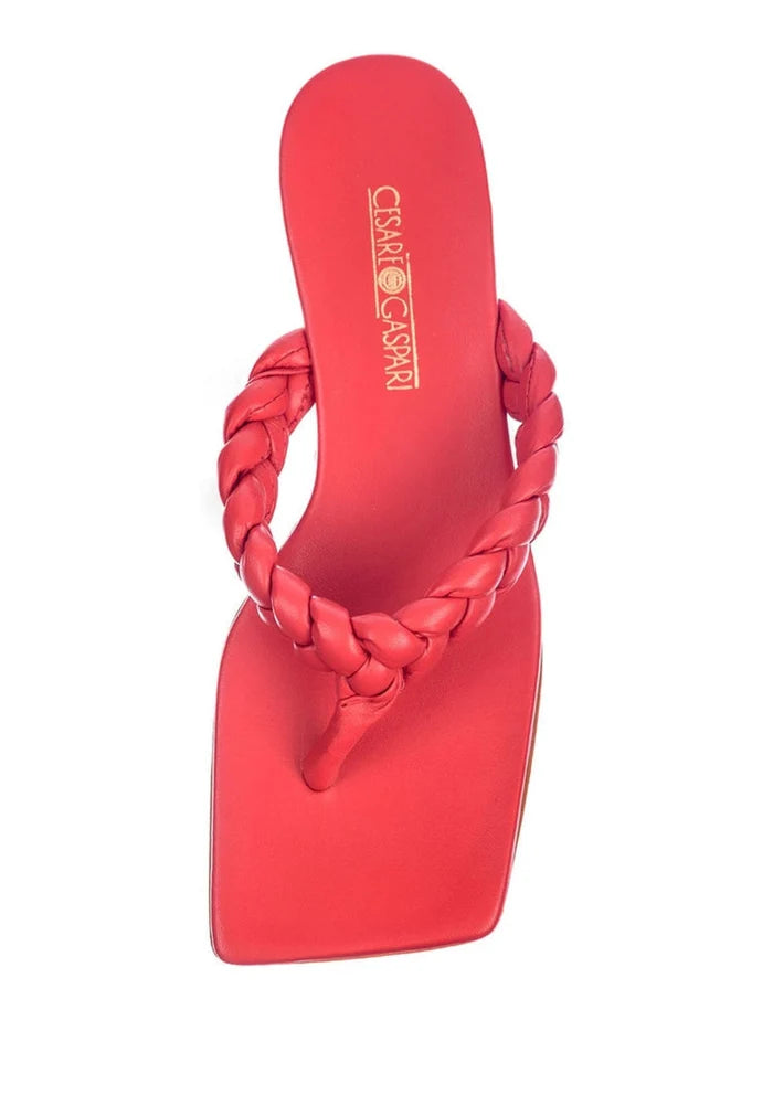A stylish and fashionable pair of red open toe sandals for a trendy and chic look.
