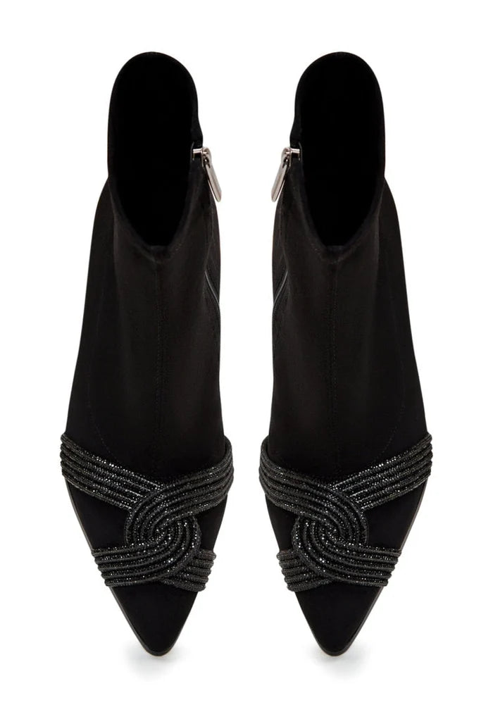 A pair of stylish suede ankle booties, perfect for a chic and trendy fashion statement.