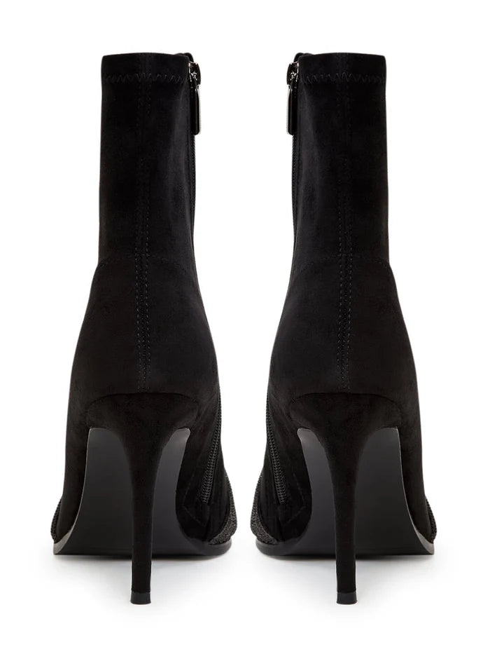 A pair of trendy suede ankle booties, perfect for a chic and stylish look.