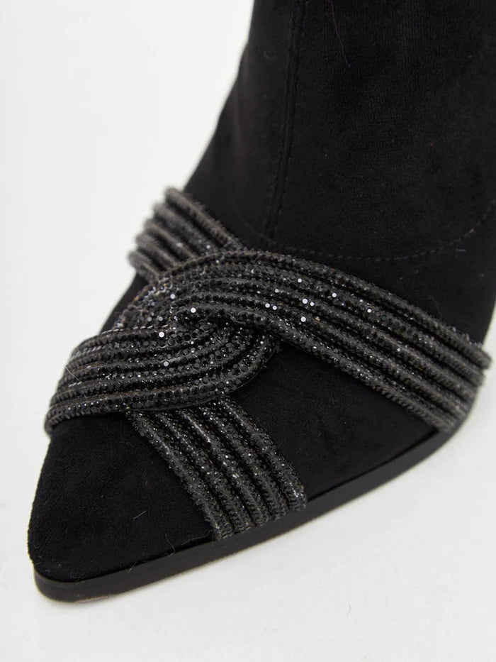 Stay on trend with these stylish suede ankle booties, the perfect chic and fashion-forward footwear choice.