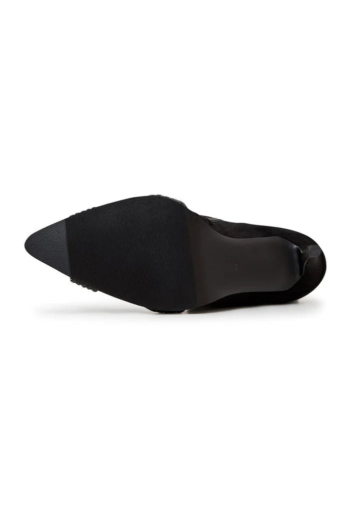 A pair of trendy suede ankle booties, perfect for chic and stylish footwear fashion.