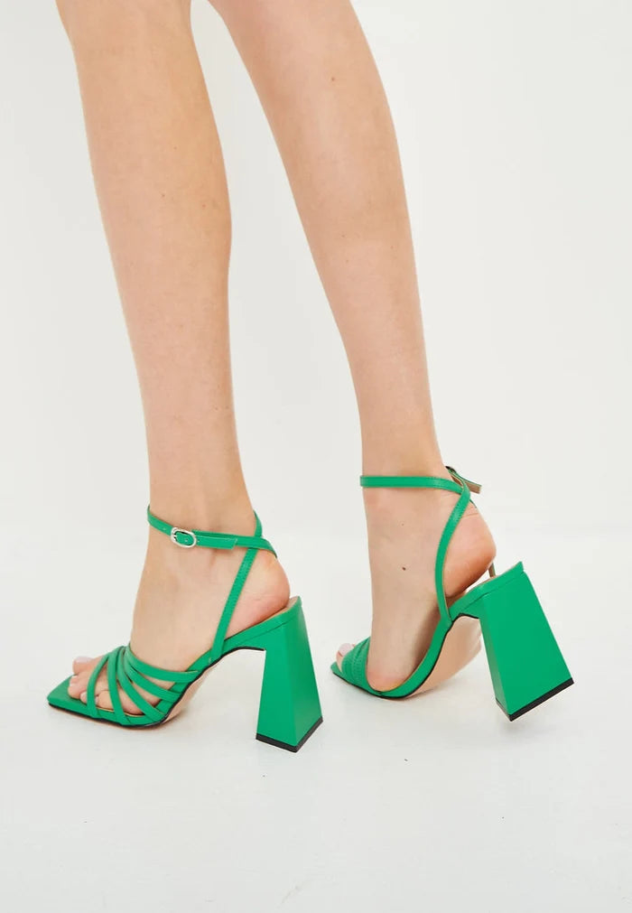 A trendy and comfortable pair of chunky green sandals perfect for summer style and all-day wear.